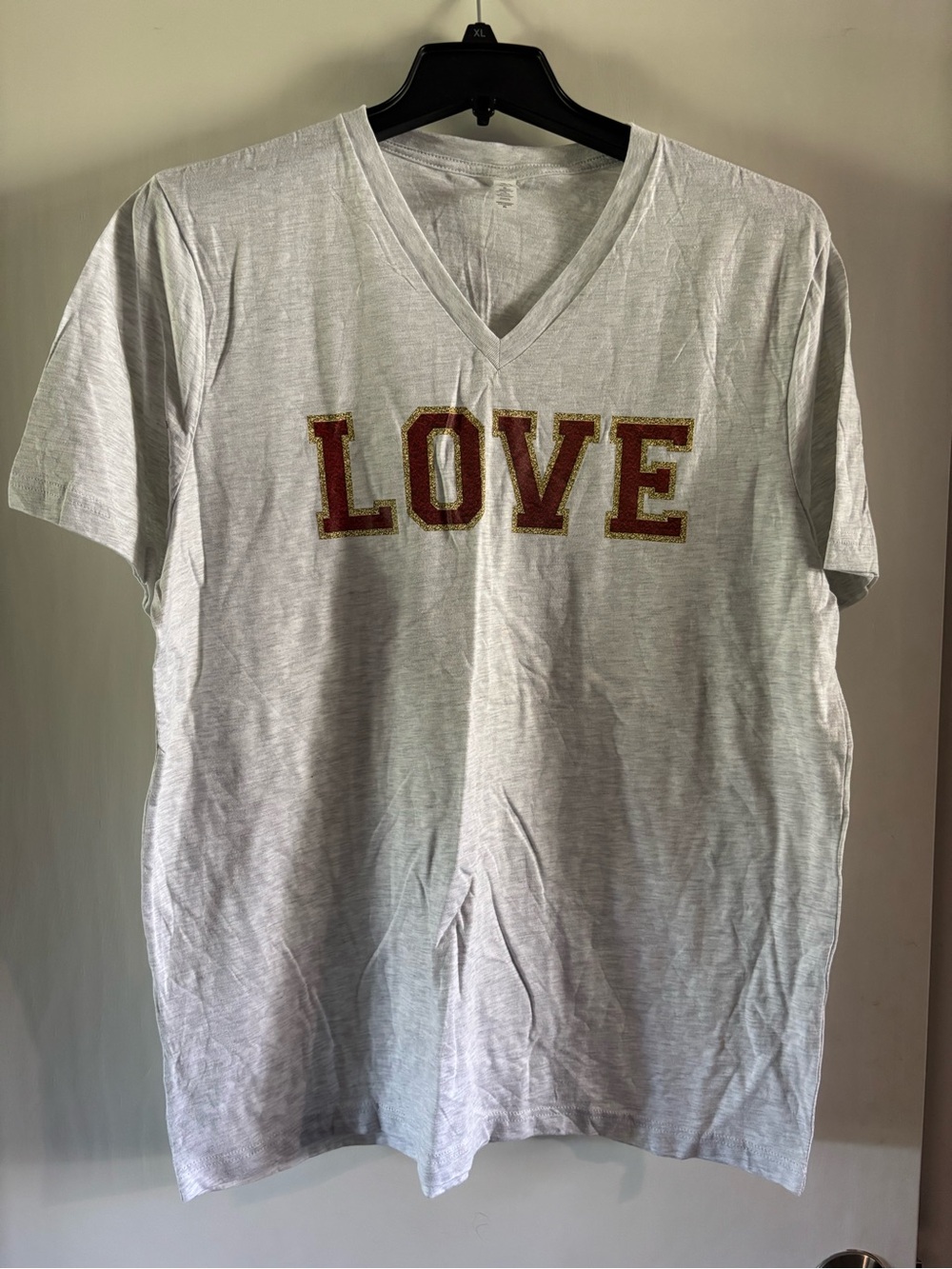 White V-Neck Tee with Red and Gold "LOVE" Graphic